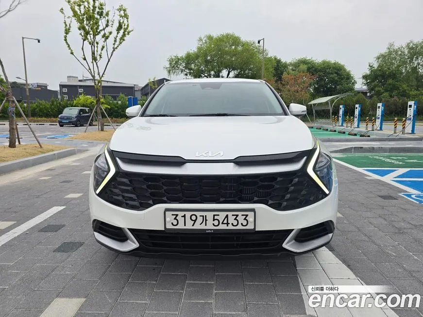 Kia Sportage — фото 10