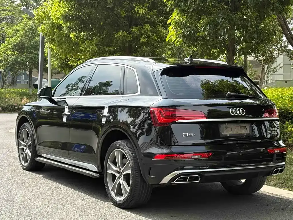 Audi Q5L — фото 10
