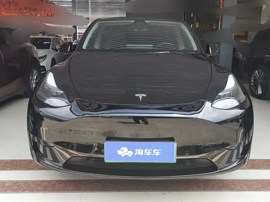 Tesla Model Y — фото 10