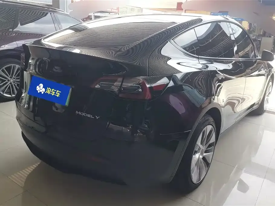 Tesla Model Y — фото 7