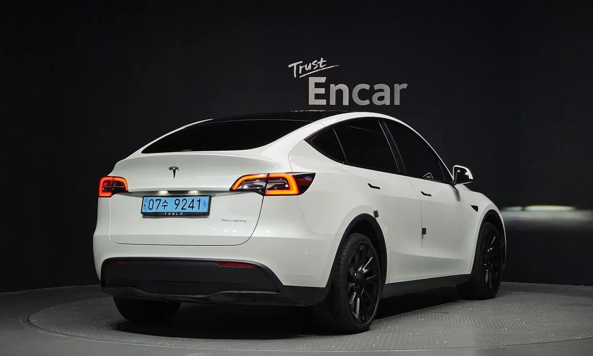 Tesla Model Y — фото 7