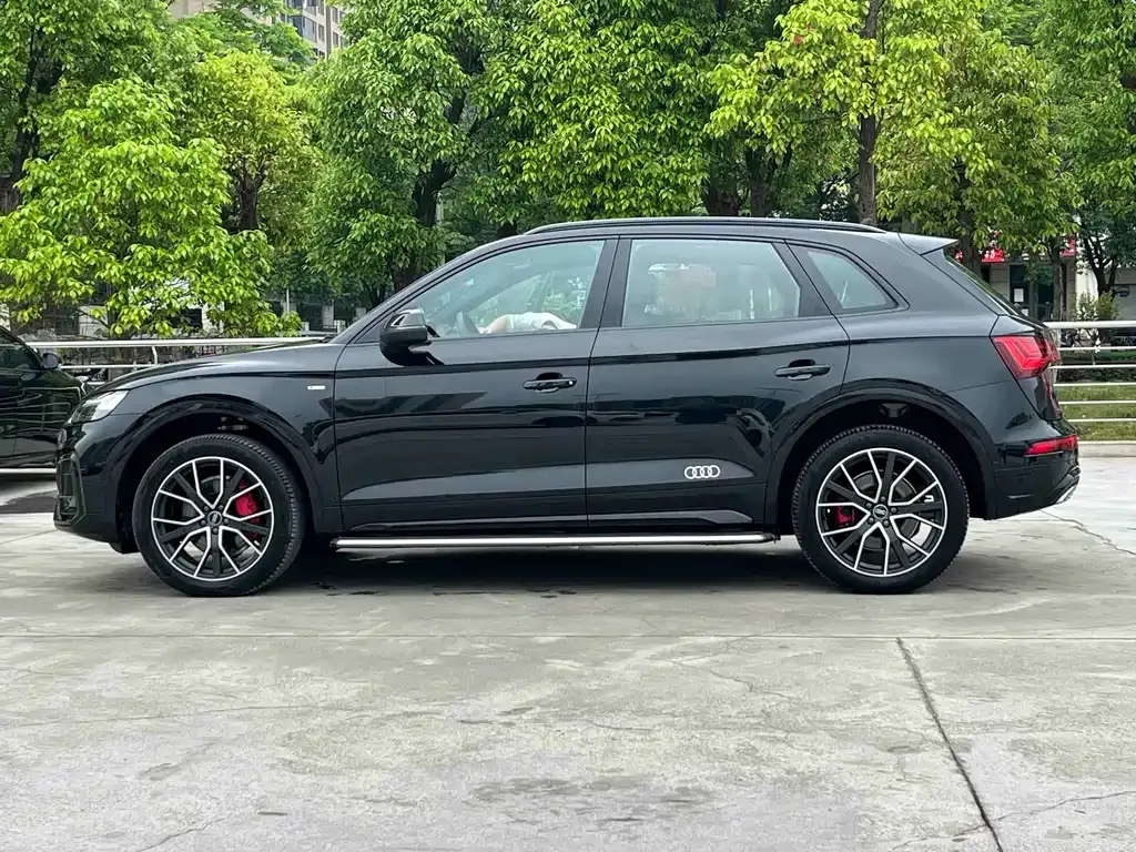Audi Q5L — фото 9