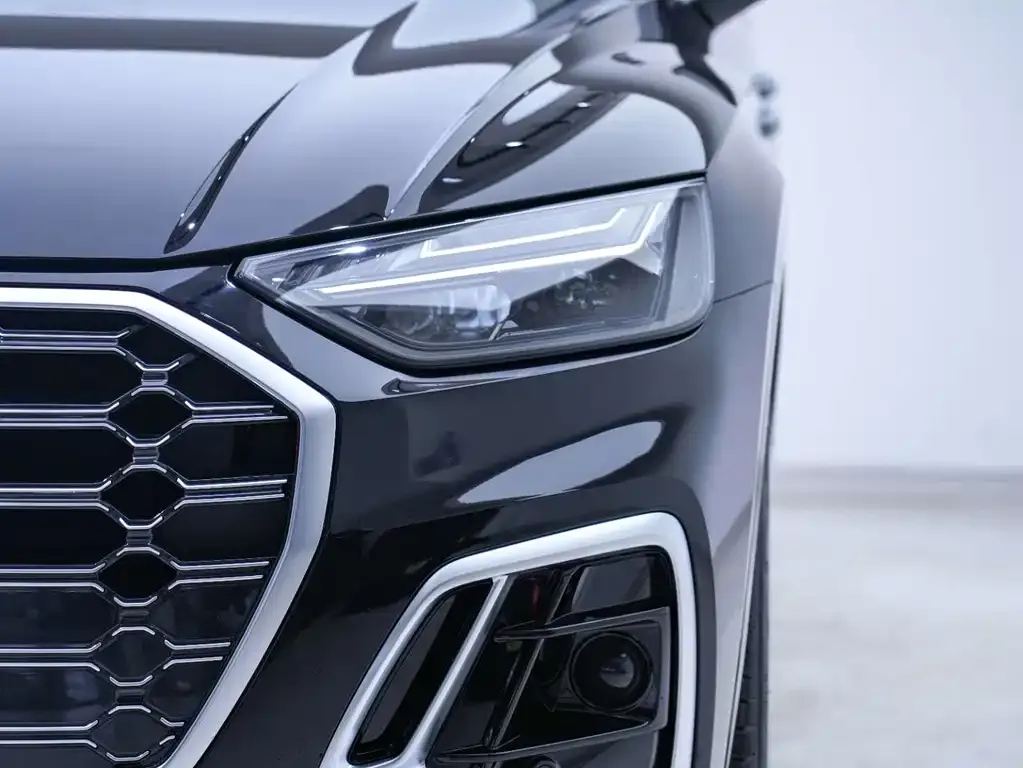 Audi Q5L — фото 7