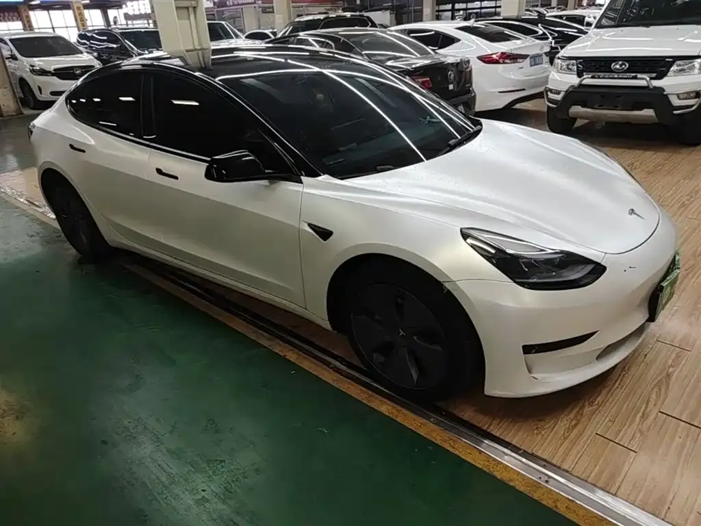 Tesla Model 3 — фото 7