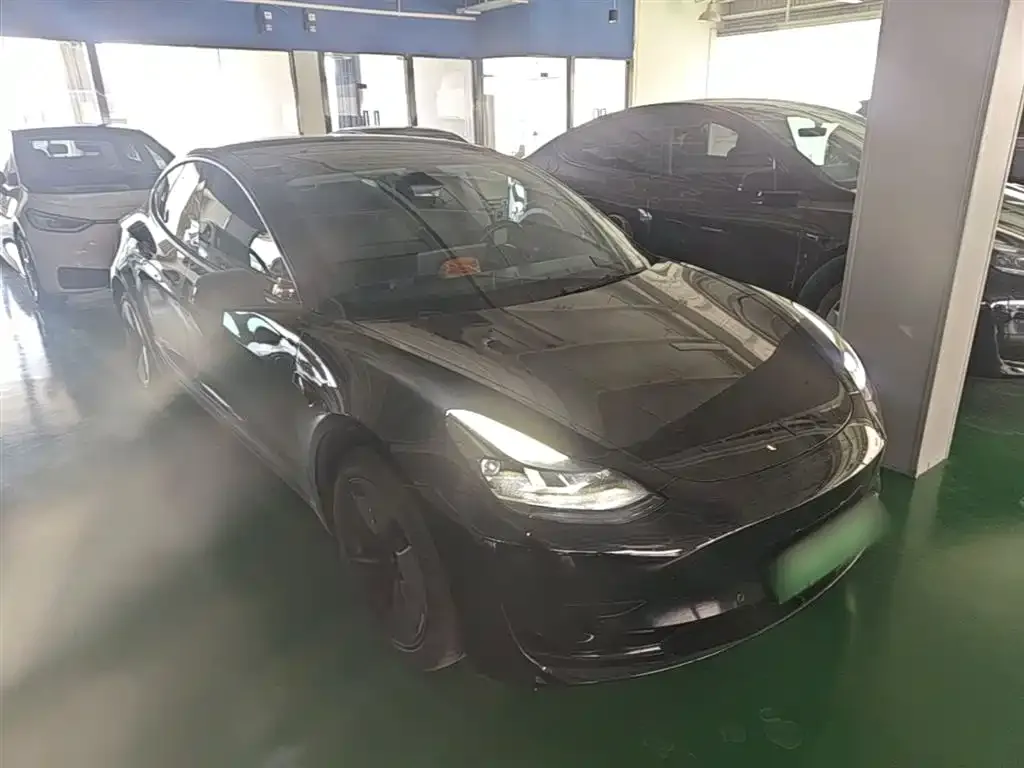 Tesla Model 3 — фото 5