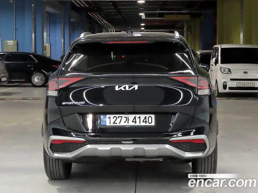 Kia Sportage — фото 7