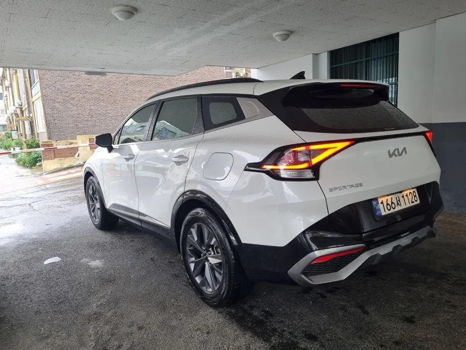 Kia Sportage — фото 9