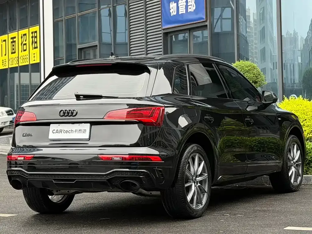 Audi Q5L — фото 10