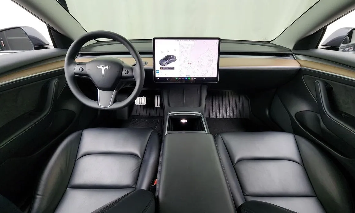 Tesla Model 3 — фото 7