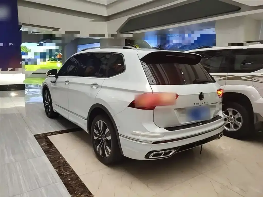 Volkswagen Tiguan L — фото 4