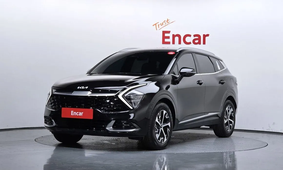 Kia Sportage — фото 1