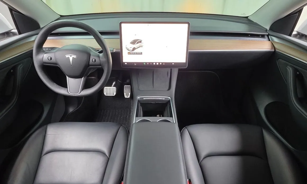 Tesla Model Y — фото 7