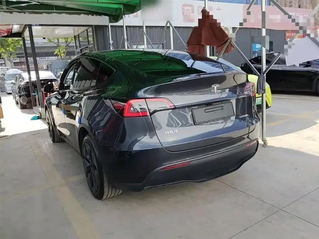 Tesla Model Y — фото 9
