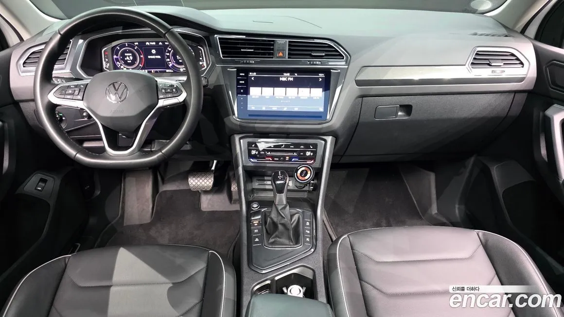 Volkswagen Tiguan — фото 10