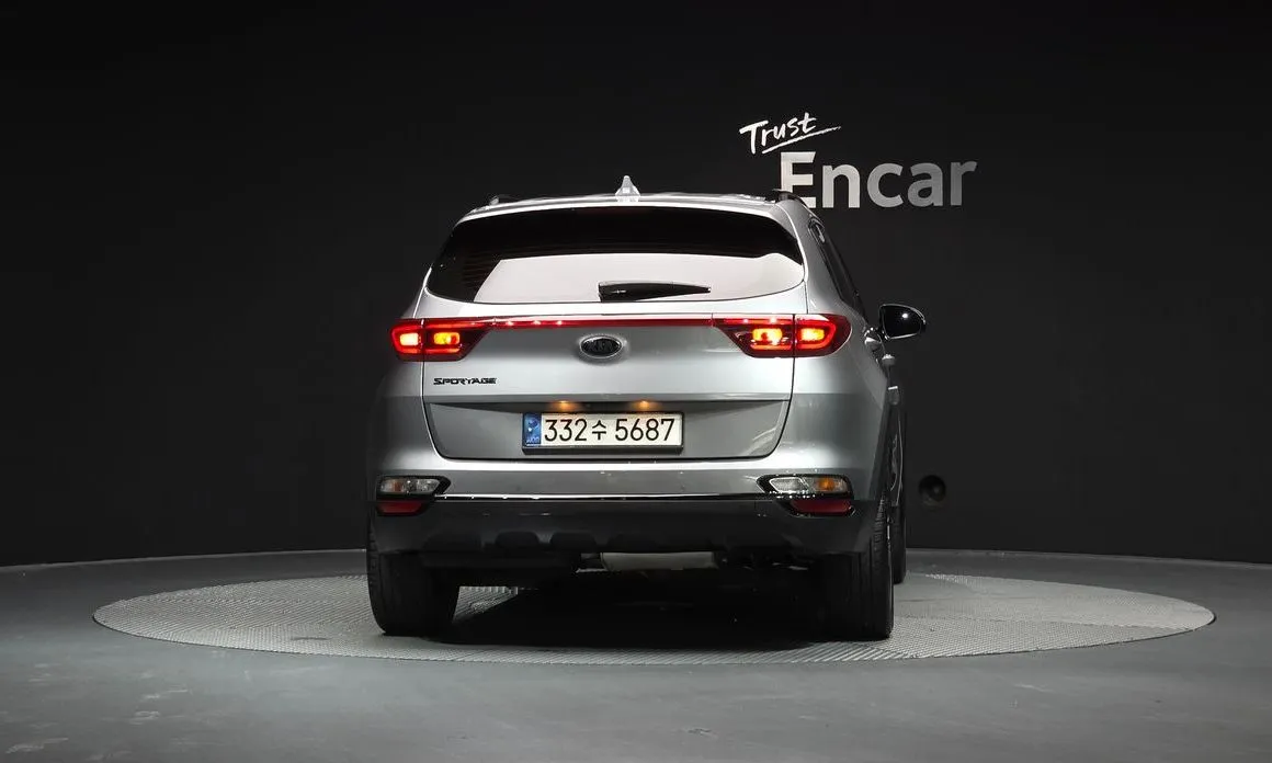 Kia Sportage — фото 7