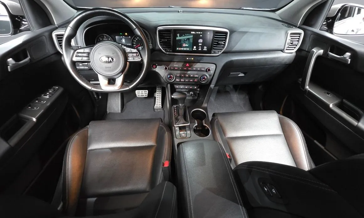 Kia Sportage — фото 9