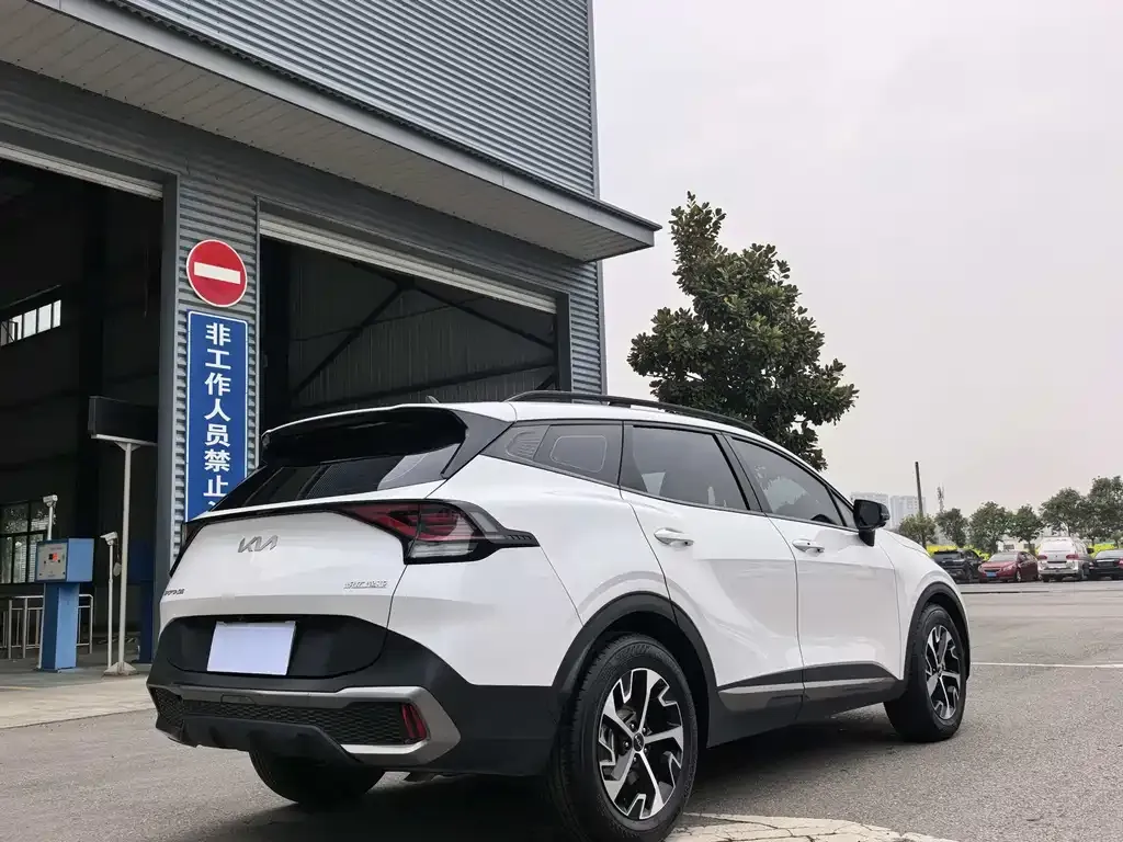 Kia Sportage — фото 8
