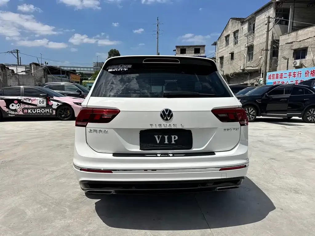 Volkswagen Tiguan L — фото 2