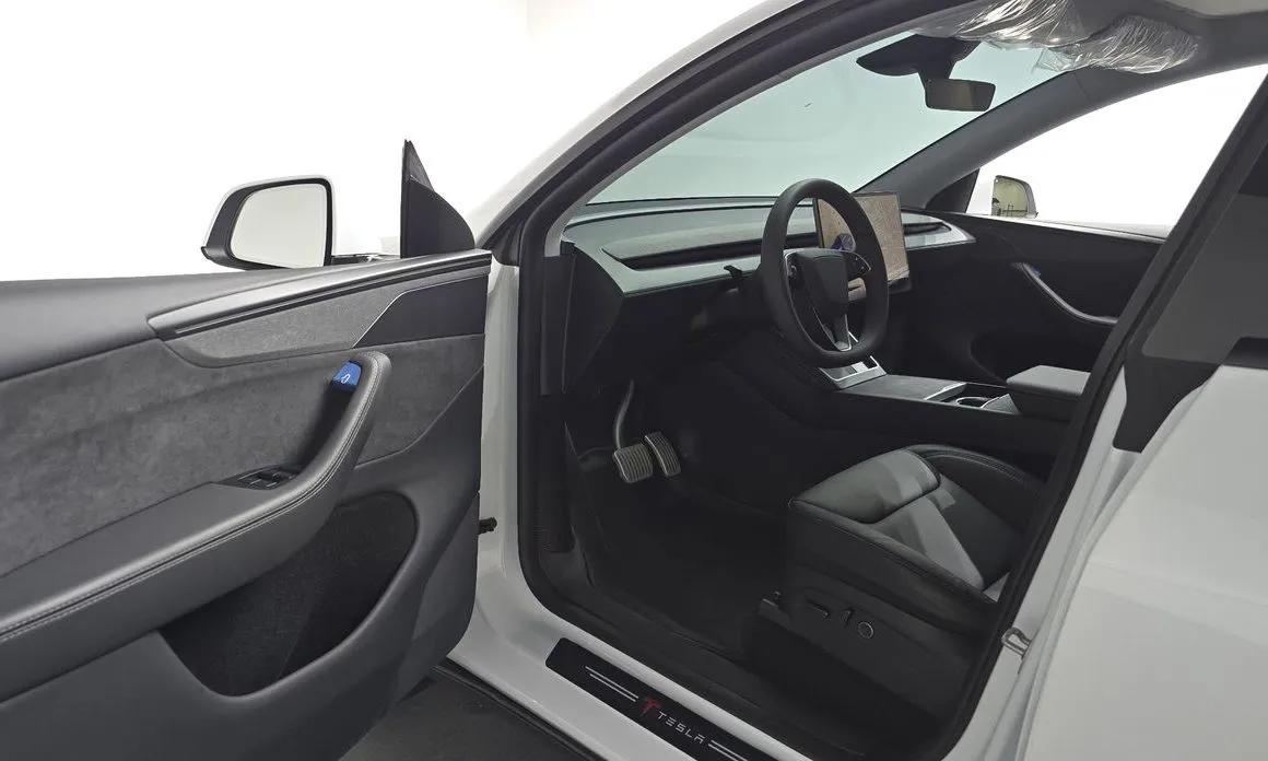 Tesla Model Y — фото 9