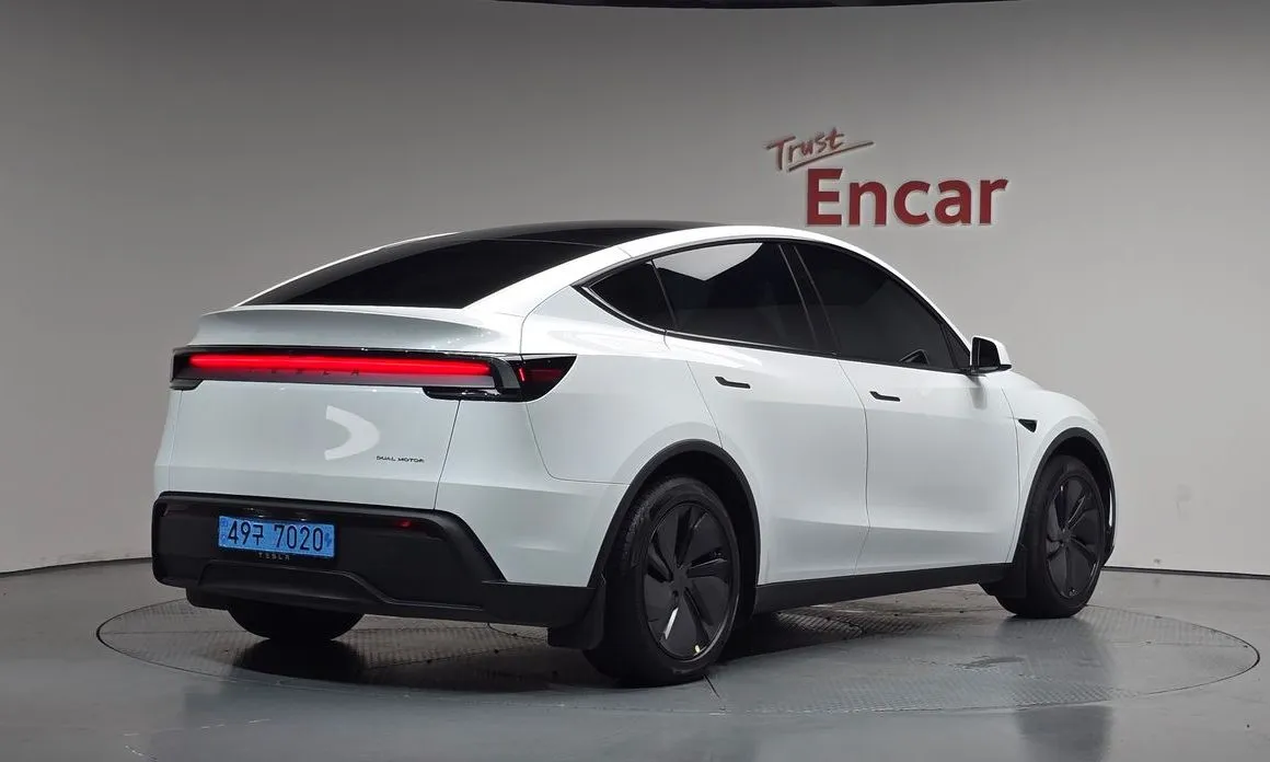 Tesla Model Y — фото 8