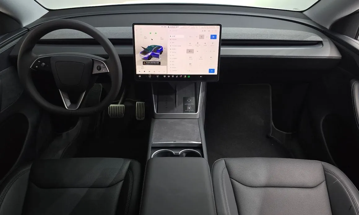 Tesla Model Y — фото 10