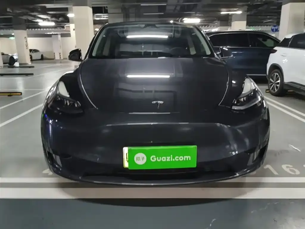 Tesla Model Y — фото 10