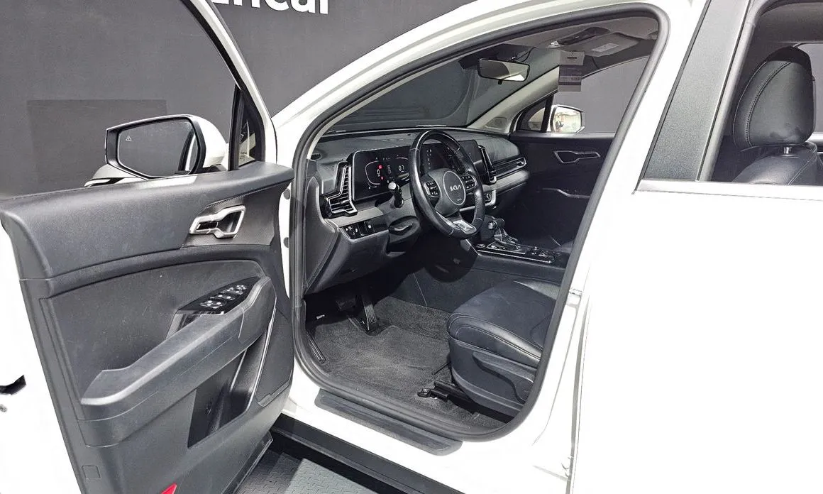 Kia Sportage — фото 10
