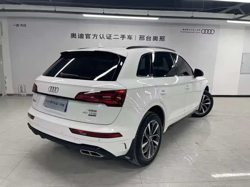 Audi Q5L — фото 7