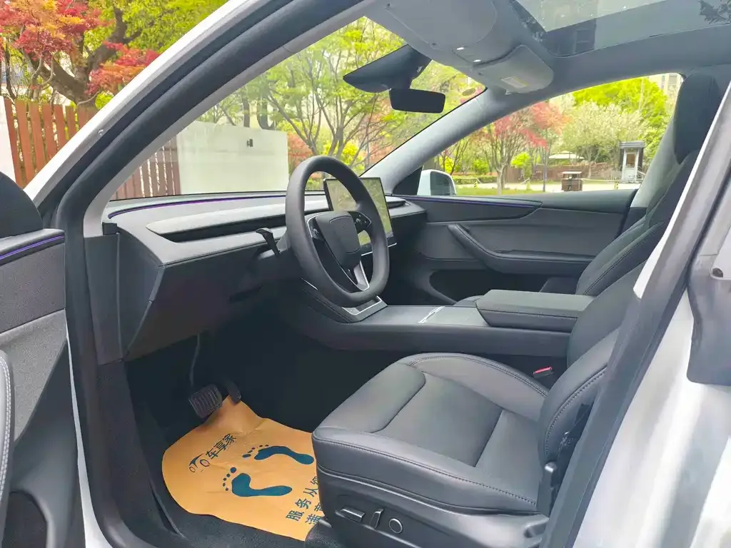 Tesla Model Y — фото 7