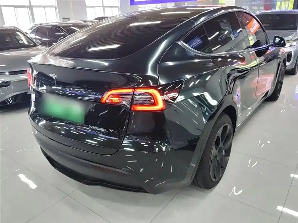 Tesla Model Y — фото 7