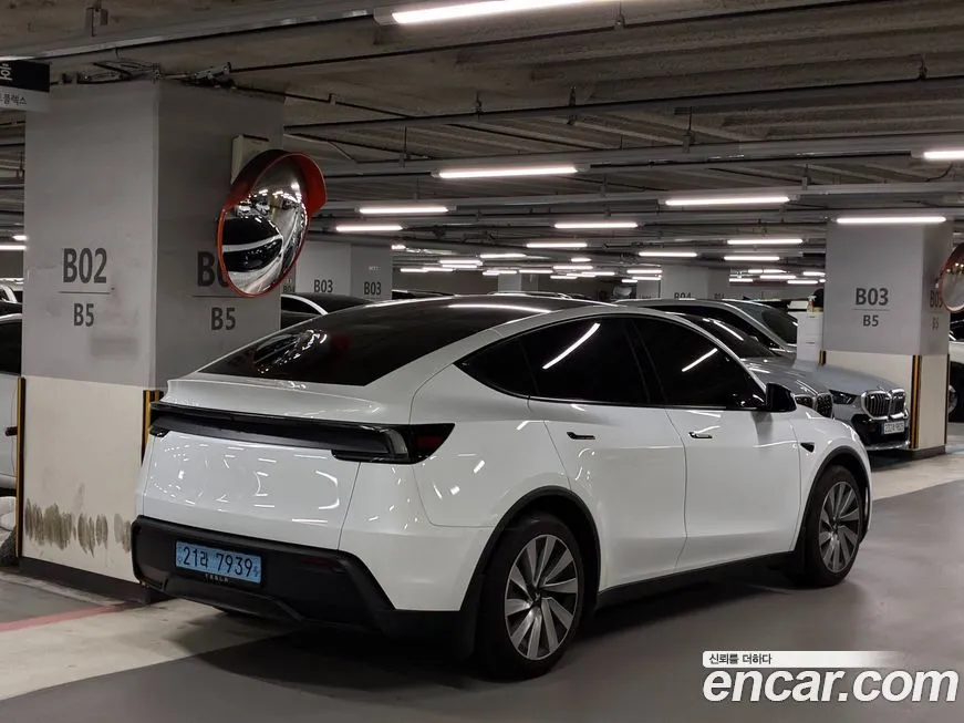 Tesla Model Y — фото 6