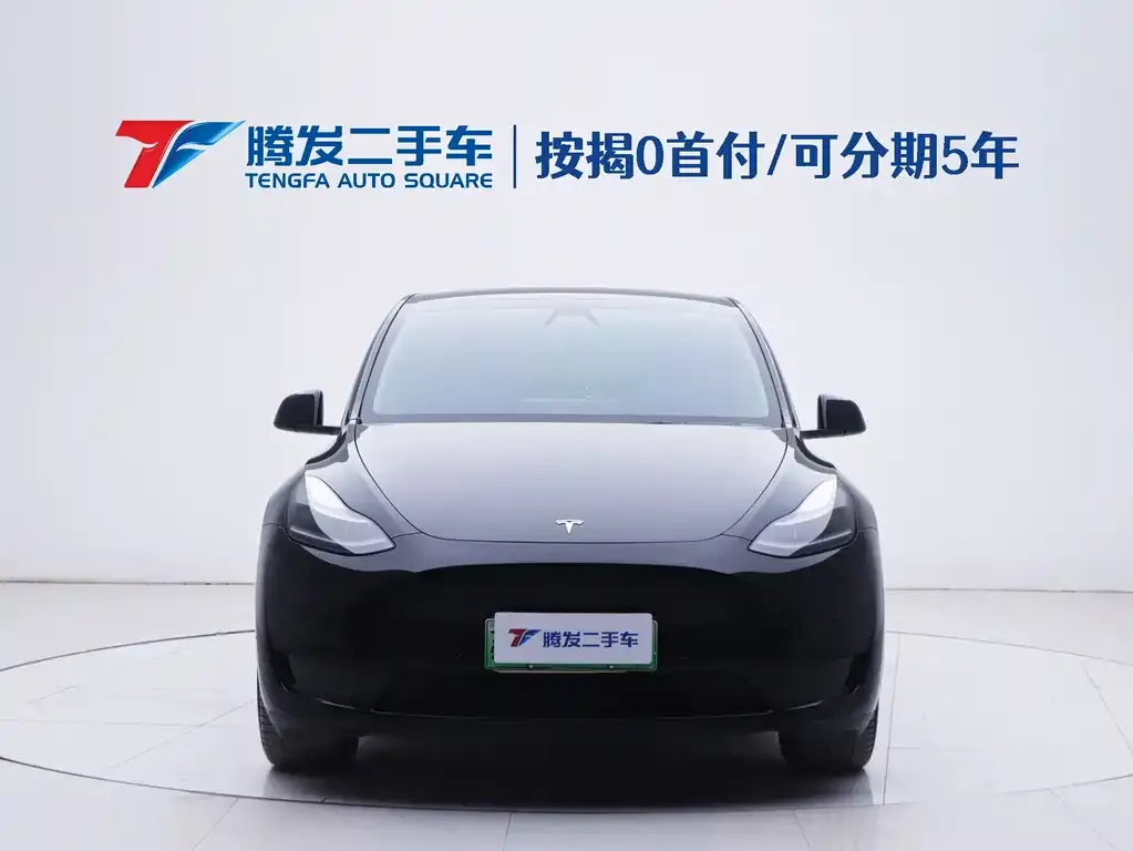 Tesla Model Y — фото 10