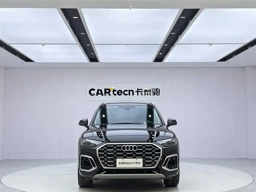 Audi Q5L — фото 10