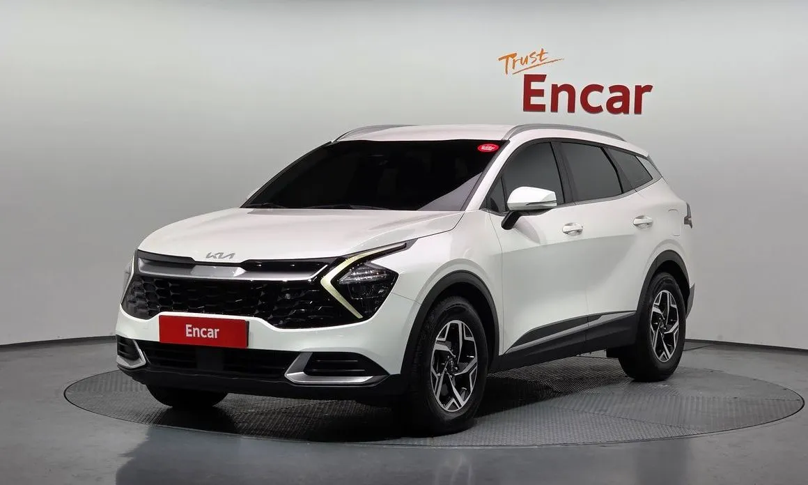 Kia Sportage — фото 1