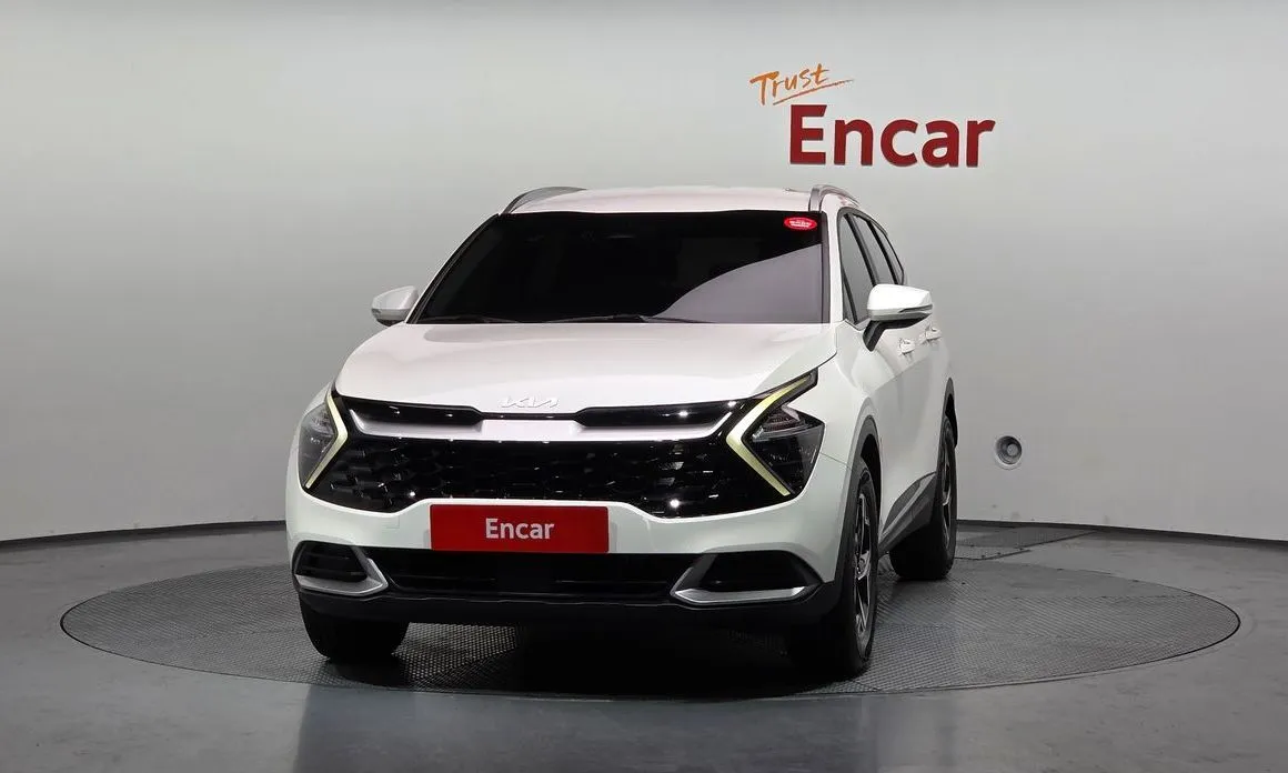 Kia Sportage — фото 7