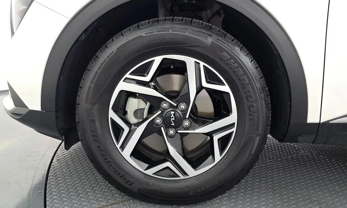 Kia Sportage — фото 10