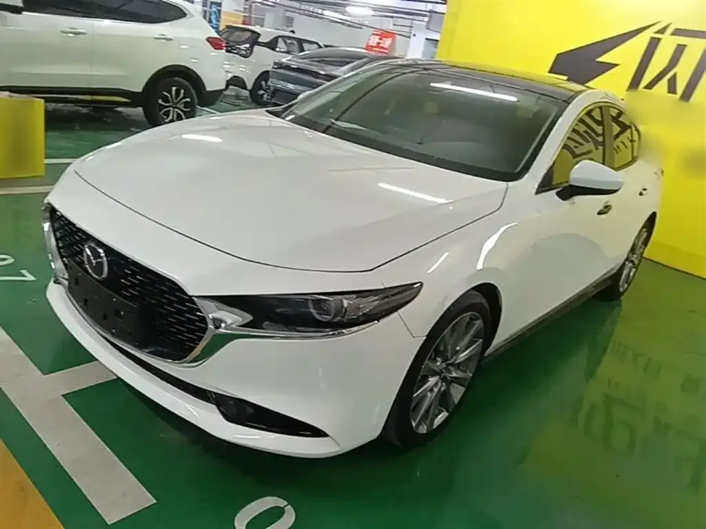 Mazda 3 Axela — фото 1