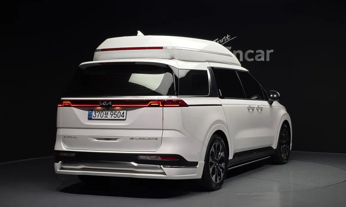 Kia Carnival — фото 10