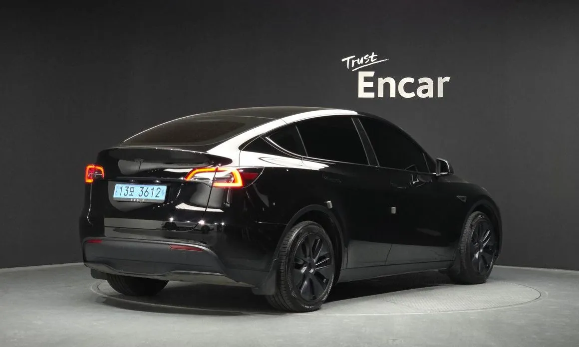 Tesla Model Y — фото 5