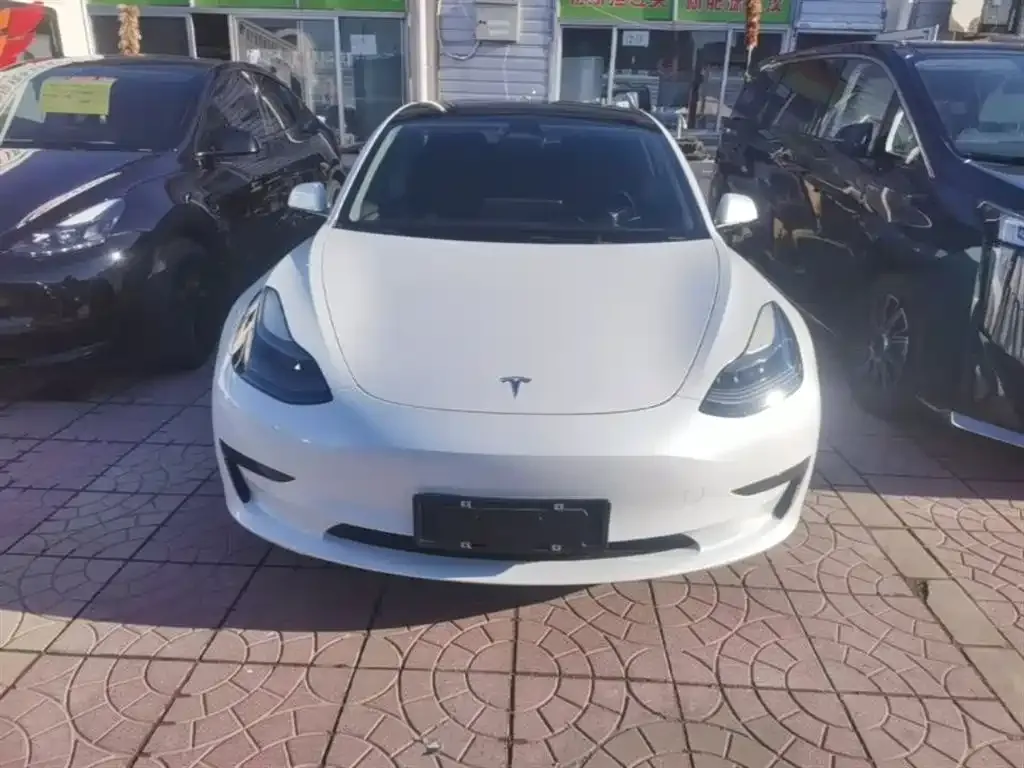 Tesla Model 3 — фото 9