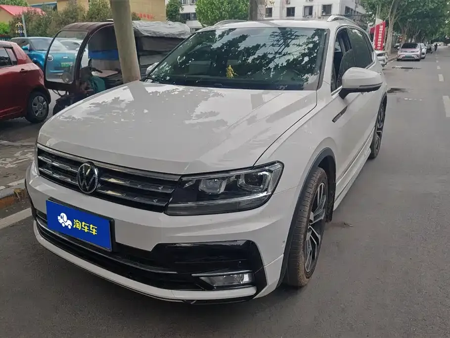 Volkswagen Tiguan L — фото 1
