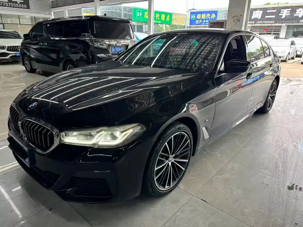 BMW 5 Series — фото 1