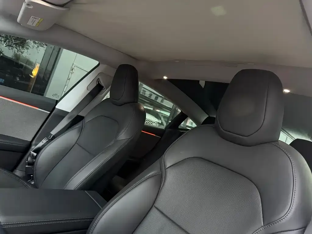 Tesla Model 3 — фото 10