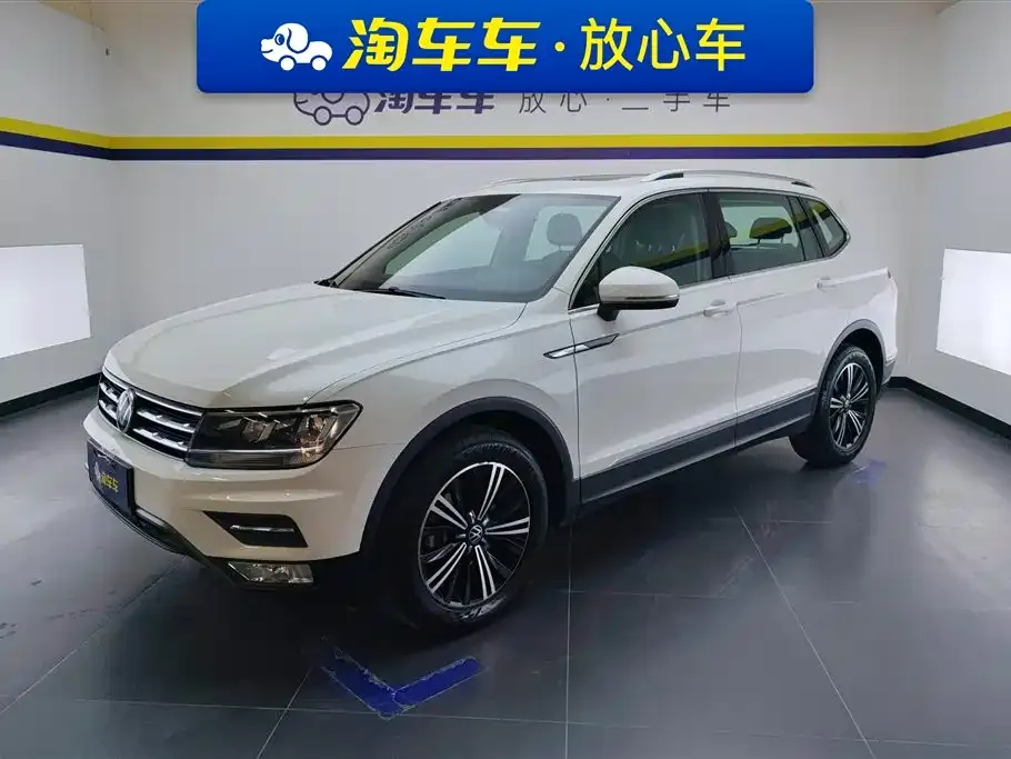 Volkswagen Tiguan L — фото 1