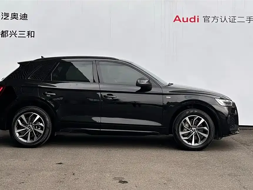 Audi Q5L — фото 10