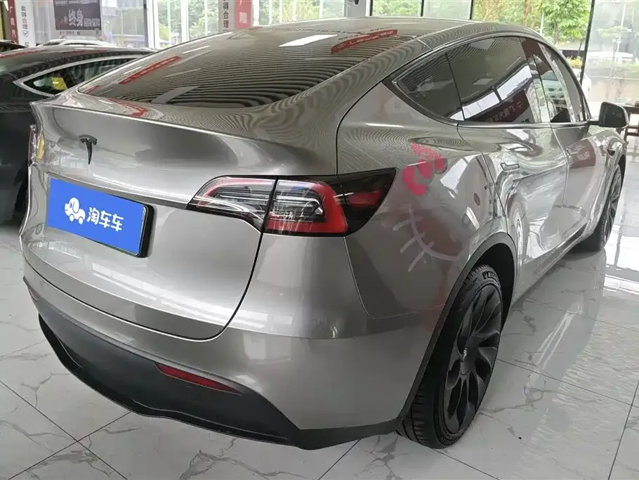 Tesla Model Y — фото 6