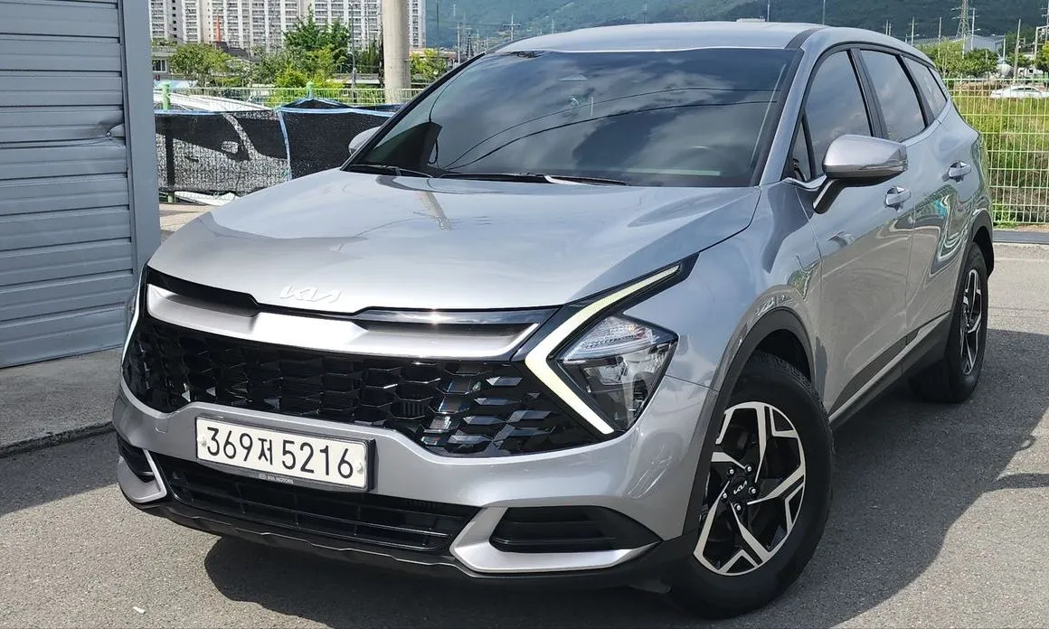 Kia Sportage — фото 1