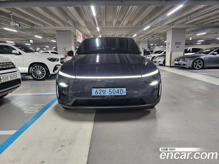 Tesla Model Y — фото 1
