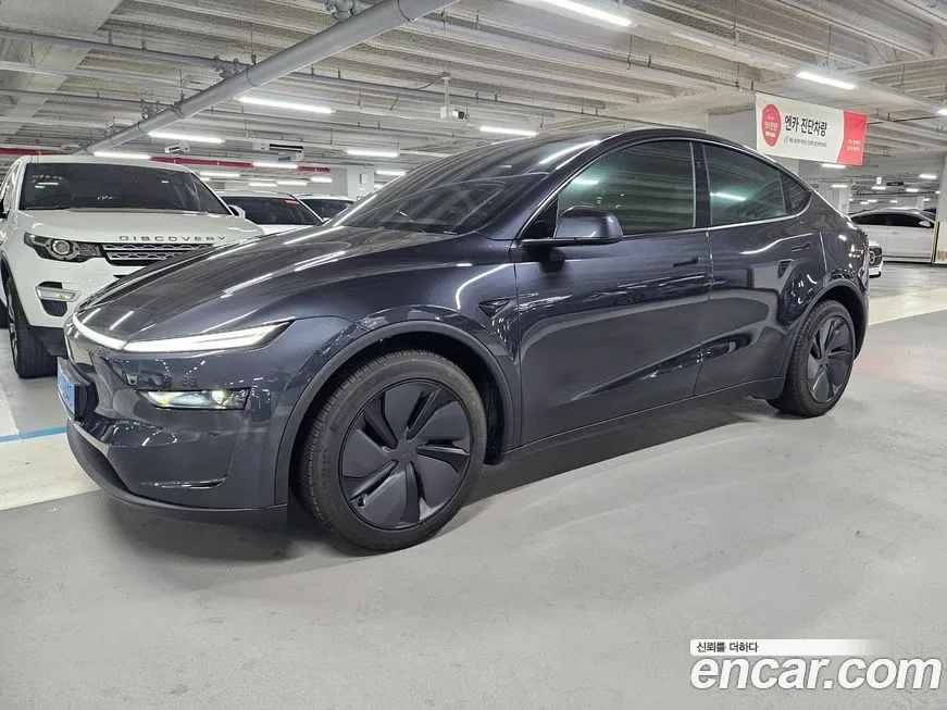 Tesla Model Y — фото 9