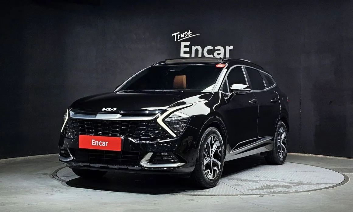 Kia Sportage — фото 1